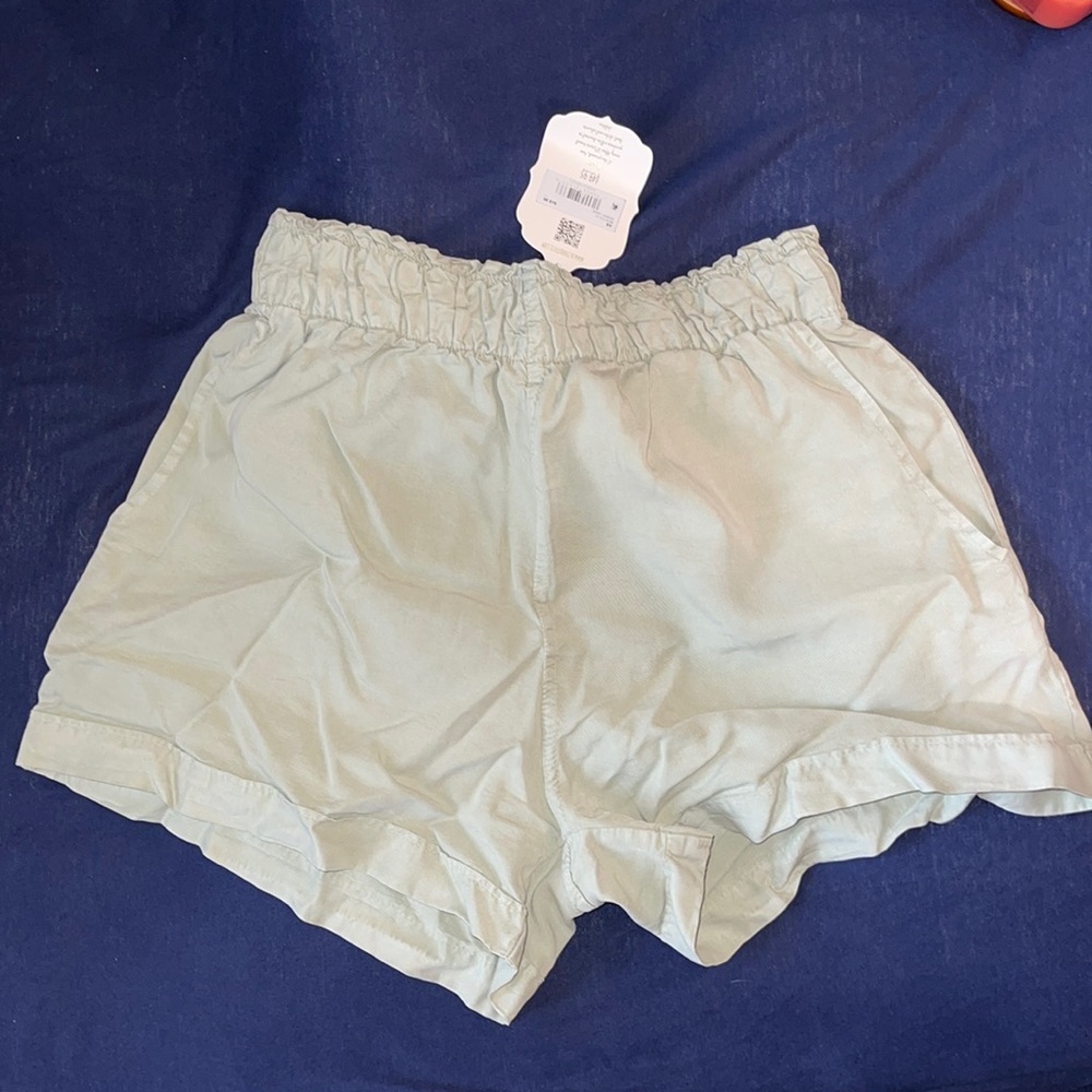 Green linen shorts